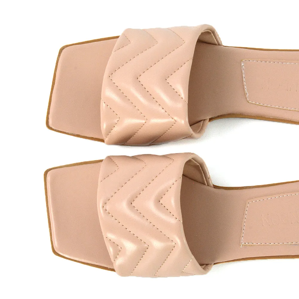 CHERRY QUILTED STRAPPY SQUARE TOE SLIDER SANDALS IN NUDE SYNTHETIC LEATHER