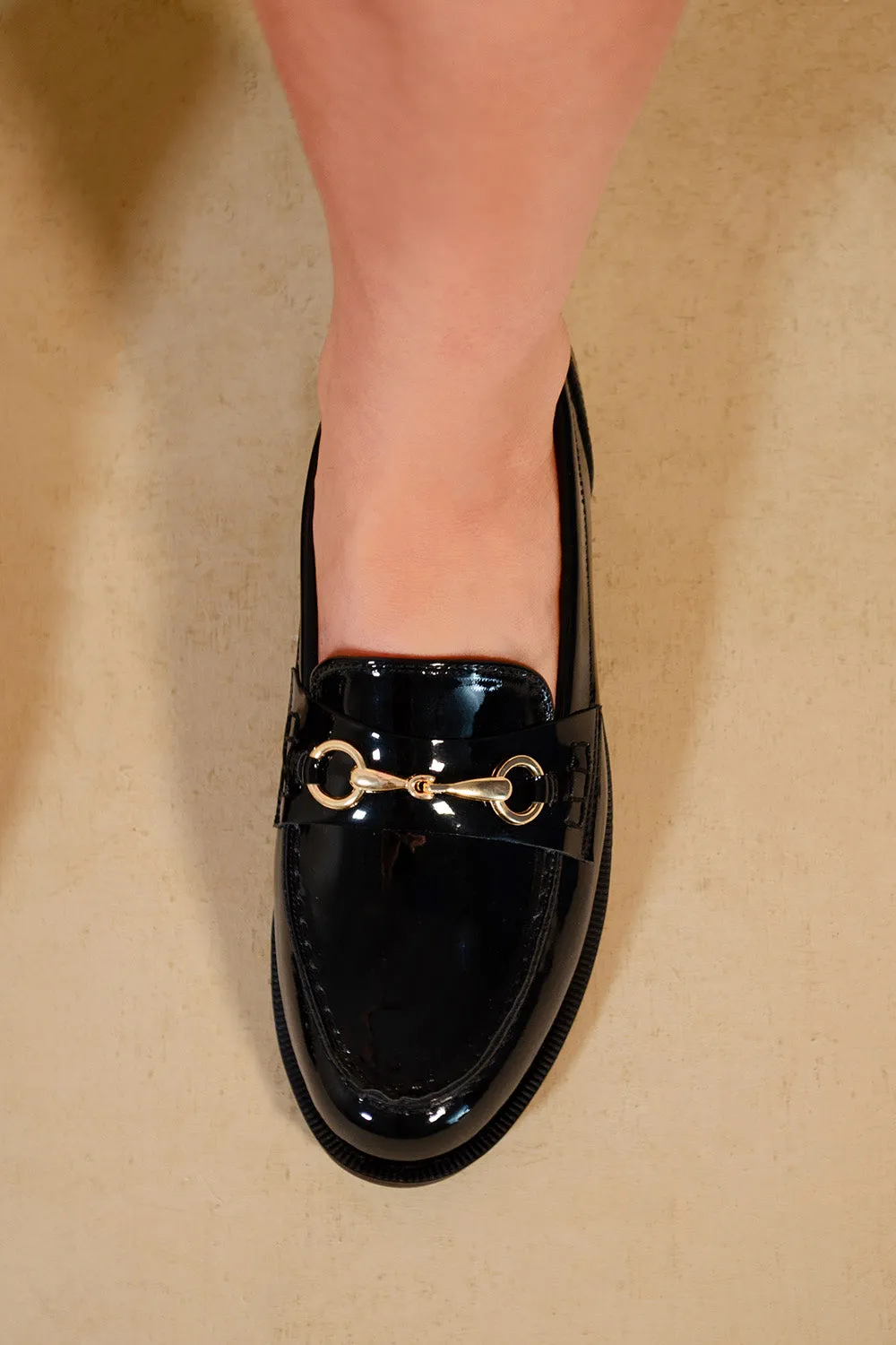 CIELO ROUND TOE SINGLE METAL BAR LOAFERS IN BLACK PATENT