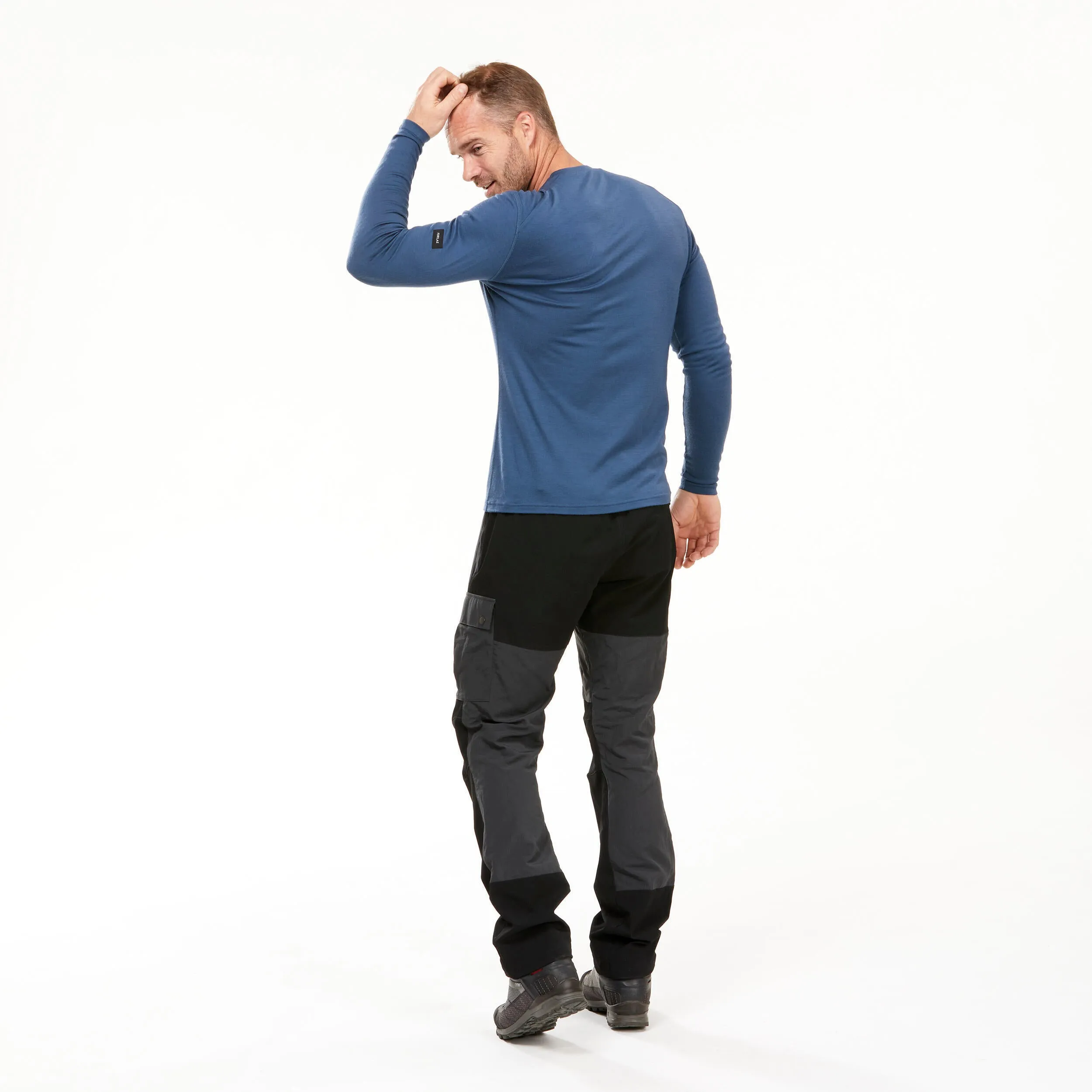 Men's longsleeve made of Forclaz merino wool for mountain trekking, blue