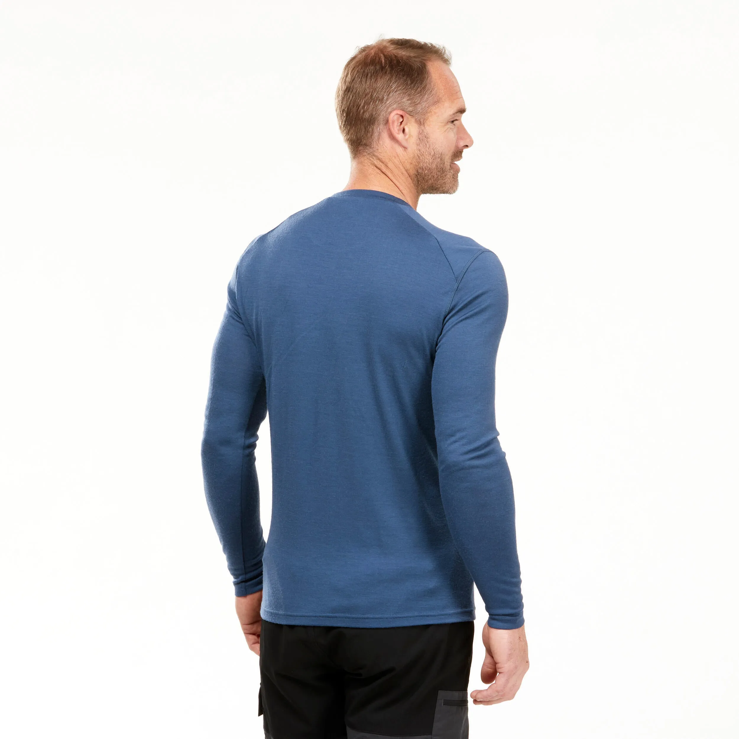 Men's longsleeve made of Forclaz merino wool for mountain trekking, blue